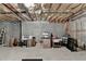 Unfinished basement with exposed ceiling and concrete walls, ideal for storage or future finishing at 8340 Royal Melbourne Way, Duluth, GA 30097