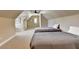 Large attic bonus bedroom with two twin beds and natural light at 8340 Royal Melbourne Way, Duluth, GA 30097