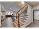Spacious hallway with staircase leading to second floor at 8340 Royal Melbourne Way, Duluth, GA 30097