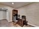Home office with a wooden desk and plenty of space for work at 8340 Royal Melbourne Way, Duluth, GA 30097
