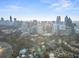 Expansive aerial view capturing the impressive Atlanta skyline and lush greenery of the surrounding parks at 199 14Th Ne St # 2312, Atlanta, GA 30309