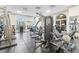 Community gym featuring modern exercise machines, free weights, and abundant natural light through large arched windows at 199 14Th Ne St # 2312, Atlanta, GA 30309