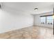Spacious living area with tile flooring, large windows, and an abundance of natural light at 199 14Th Ne St # 2312, Atlanta, GA 30309