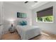 Bedroom with neutral decor, large windows and hardwood floors at 2385 Nesbitt Dr, Brookhaven, GA 30319