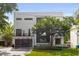 Modern two-story home with a black and white exterior at 2385 Nesbitt Dr, Brookhaven, GA 30319
