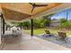 Outdoor living space with lounge chairs, dining set, and a built-in outdoor kitchen at 2385 Nesbitt Dr, Brookhaven, GA 30319