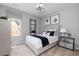 Cozy bedroom with neutral decor, stylish furnishings, and ample natural light from a window at 3062 Cambridge Mill St, Acworth, GA 30102
