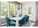 Bright dining room with large windows and comfortable seating for a cozy atmosphere at 3062 Cambridge Mill St, Acworth, GA 30102