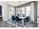 Elegant dining room with stylish decor, natural light, and a modern chandelier at 3062 Cambridge Mill St, Acworth, GA 30102