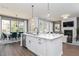 Bright kitchen and dining area with stainless steel appliances and modern finishes at 3062 Cambridge Mill St, Acworth, GA 30102