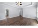 Bright and spacious main bedroom with tray ceiling and ensuite bath access at 3826 Baxley Village Trl, Suwanee, GA 30024
