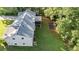 Spacious backyard featuring a deck, playground, and plenty of green space at 4353 White Oak Dr, Sugar Hill, GA 30518
