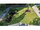 Well-manicured front yard with nice landscaping and a long driveway at 4353 White Oak Dr, Sugar Hill, GA 30518
