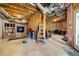 Spacious unfinished basement offering possibilities for recreation or storage with exposed ductwork and concrete flooring at 101 Misty Valley Dr, Canton, GA 30114