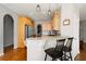 Kitchen with bar seating, stainless appliances, and granite counters at 101 Misty Valley Dr, Canton, GA 30114