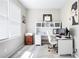 Office with large window, modern desk, and neutral decor at 101 Misty Valley Dr, Canton, GA 30114