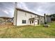 Large backyard featuring a covered patio and a built-in fire pit at 200 Eva Way Ne, Cartersville, GA 30121
