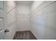 Spacious walk-in closet with metal shelving and carpet flooring at 200 Eva Way Ne, Cartersville, GA 30121