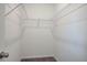 Walk-in closet features metal shelving and carpet at 200 Eva Way Ne, Cartersville, GA 30121