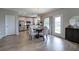 Open floor plan featuring a dining area with stainless steel appliances and a backyard view at 200 Eva Way Ne, Cartersville, GA 30121