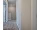 Carpeted hallway with neutral walls and white trim at 200 Eva Way Ne, Cartersville, GA 30121