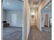 Hallway featuring carpeted floor with open doorways to the bedrooms and bathroom at 200 Eva Way Ne, Cartersville, GA 30121