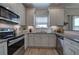 Kitchen showcases granite countertops, subway tile backsplash and stainless steel appliances at 200 Eva Way Ne, Cartersville, GA 30121