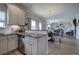 Open-concept kitchen flowing into living area and dining, promoting a spacious design at 200 Eva Way Ne, Cartersville, GA 30121