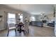 Bright living space with hardwood floors, modern furnishings, fireplace, and view of the dining area at 200 Eva Way Ne, Cartersville, GA 30121