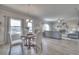 Open-concept living and dining area with hardwood floors and plenty of natural light at 200 Eva Way Ne, Cartersville, GA 30121