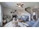Comfortable living room featuring a fireplace, ceiling fan, and neutral decor at 200 Eva Way Ne, Cartersville, GA 30121