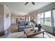 Open-concept living room with hardwood floors, natural light, and access to the kitchen at 200 Eva Way Ne, Cartersville, GA 30121