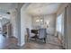 Stylish home office featuring coffered ceilings, custom millwork, and modern light fixture at 200 Eva Way Ne, Cartersville, GA 30121