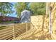 A wooden patio overlooks the backyard and apartment complex at 262 Crumley St Sw, Atlanta, GA 30312