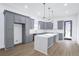 Bright kitchen featuring grey cabinets, light countertops, and an island with pendant lighting at 262 Crumley St Sw, Atlanta, GA 30312