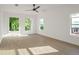 Bright main bedroom with light floors and large windows at 262 Crumley St Sw, Atlanta, GA 30312