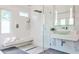 The luxurious bathroom offers a glass shower, stylish fixtures, and a sleek design at 2682 Boulder Creek Ne Dr, Roswell, GA 30075