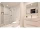 Modern bathroom featuring a glass-enclosed shower and sleek vanity with contemporary fixtures at 2682 Boulder Creek Ne Dr, Roswell, GA 30075