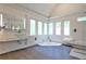 Bright bathroom boasts modern fixtures, a large soaking tub, and walk-in shower at 2682 Boulder Creek Ne Dr, Roswell, GA 30075
