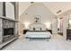 Bright and airy main bedroom with vaulted ceiling, fireplace, and ensuite bathroom access at 2682 Boulder Creek Ne Dr, Roswell, GA 30075