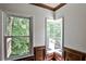 Corner room with detailed woodwork and bay windows that provides natural light at 2682 Boulder Creek Ne Dr, Roswell, GA 30075