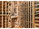 Rustic wine cellar featuring brick accents and wooden shelving for ample bottle storage at 2682 Boulder Creek Ne Dr, Roswell, GA 30075