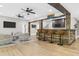 Finished basement with a large bar, wood accents, and seating area for entertaining at 407 Estates View Dr, Acworth, GA 30101