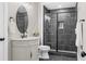 Bathroom showcasing a glass-enclosed shower and traditional vanity at 407 Estates View Dr, Acworth, GA 30101