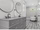 Bright bathroom with double vanity, granite countertops, and soaking tub at 407 Estates View Dr, Acworth, GA 30101