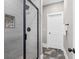 Bright bathroom features modern finishes, a walk-in shower, and stylish black hardware at 407 Estates View Dr, Acworth, GA 30101