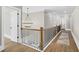 Hallway has hardwood floors, and decorative lighting at 407 Estates View Dr, Acworth, GA 30101