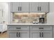 Kitchen detail showing granite countertops, tile backsplash, and stainless steel appliances at 407 Estates View Dr, Acworth, GA 30101