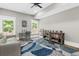 Home office with natural light, light gray walls, and a comfortable seating area at 407 Estates View Dr, Acworth, GA 30101