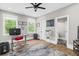 Bright home office with windows, hard wood floors, and stylish decor at 407 Estates View Dr, Acworth, GA 30101